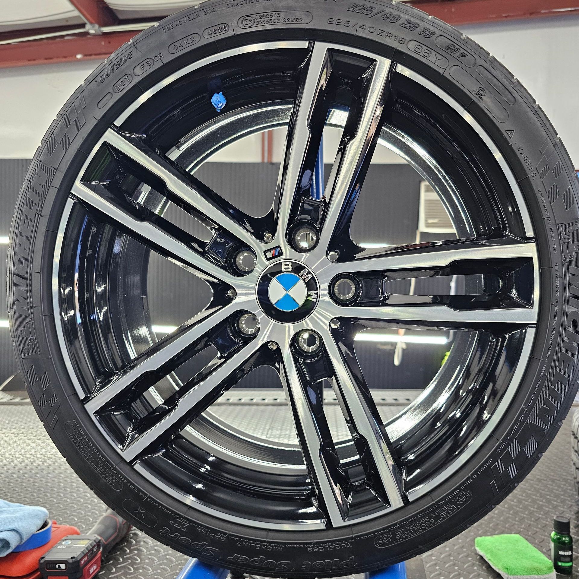 A close up of a bmw wheel with a tire on it
