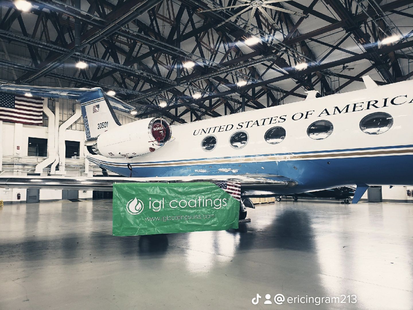 A united states of america airplane is parked in a hangar