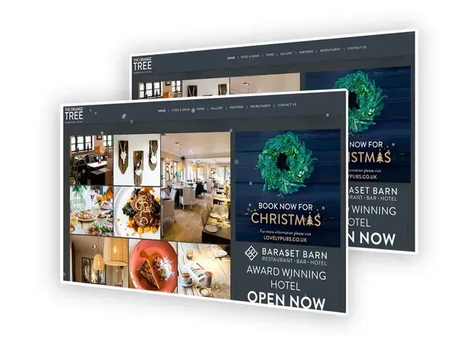 Website of Daraset Barn Hotel advertising Christmas bookings, with a wreath and food photos.