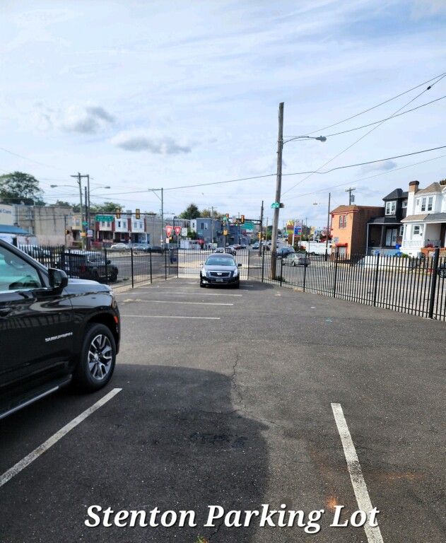 A car is parked in a parking lot called the stenton parking lot