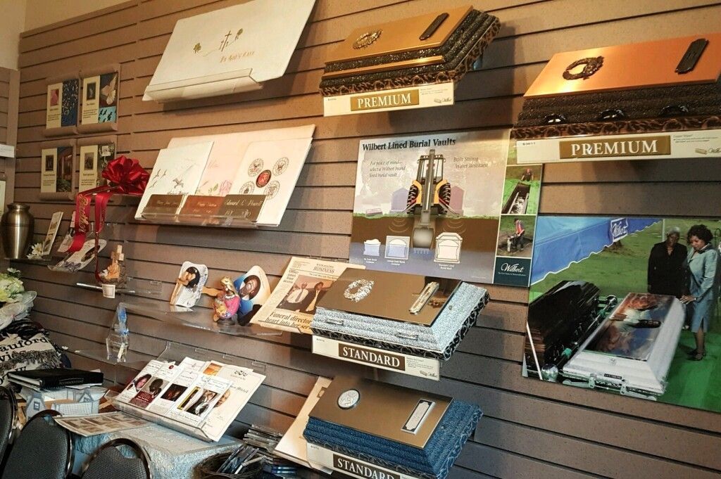 A wall with a lot of pictures on it and a sign that says premium