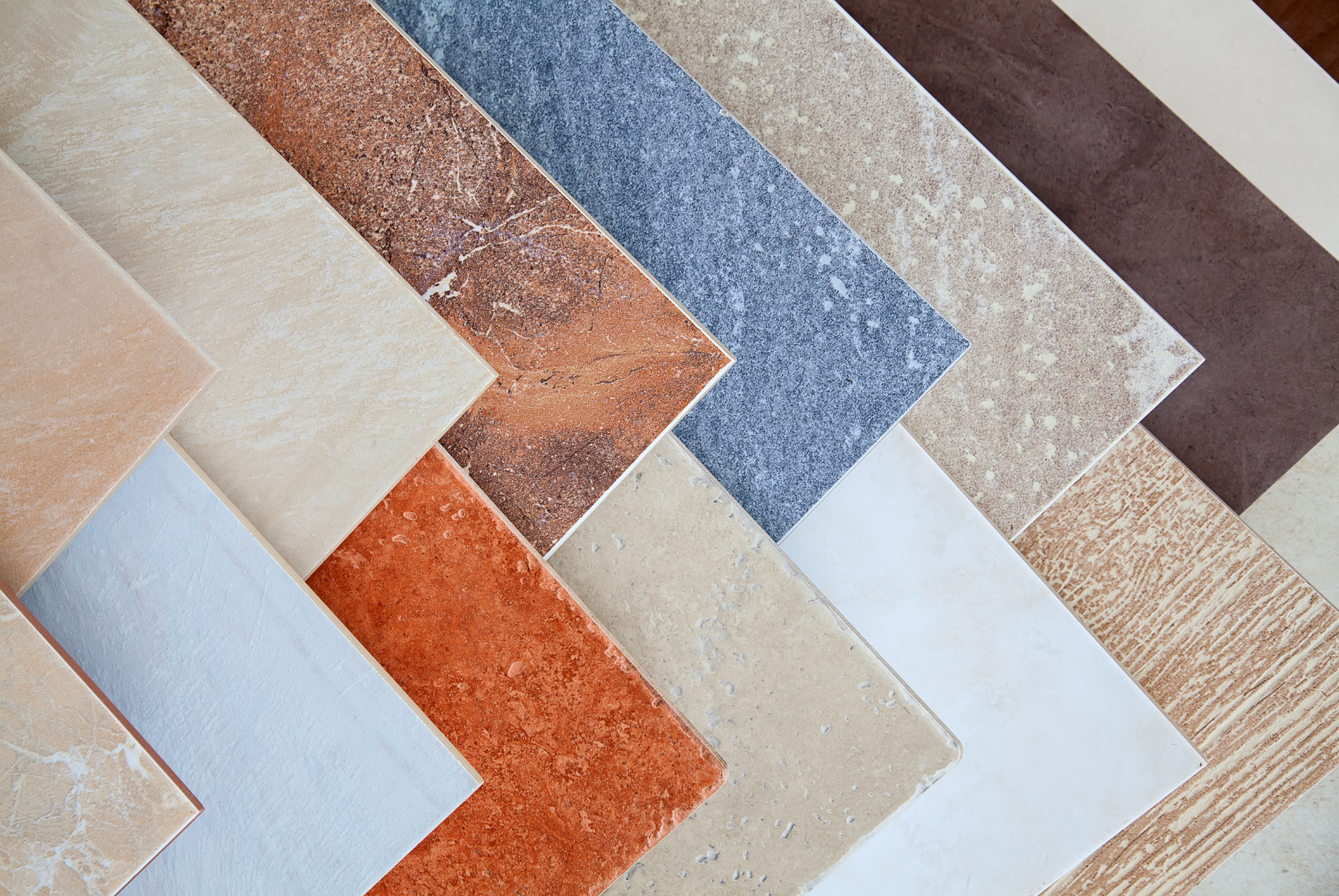 A bunch of different colored tiles are stacked on top of each other.