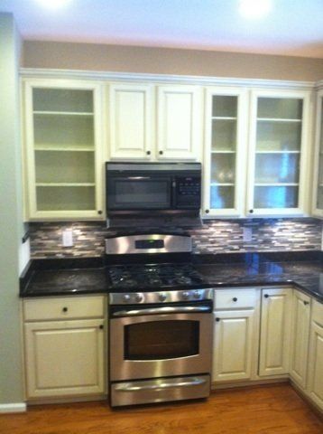 Cabinet with Stove and Oven — Tucker, GA — Atlanta Kitchen Refinishers Inc.