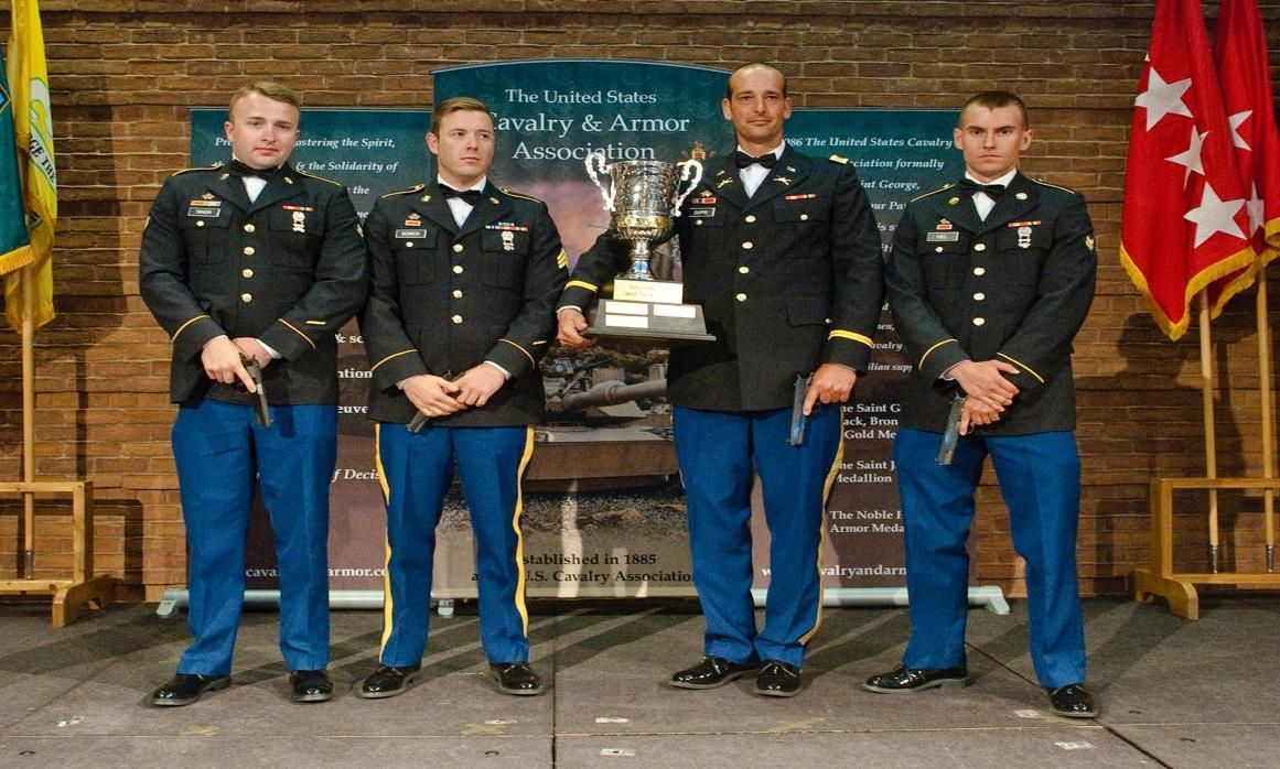 A group of men in military uniforms standing next to each other