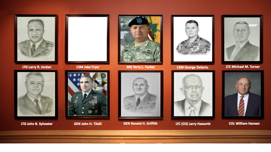 A wall with a bunch of pictures of men on it