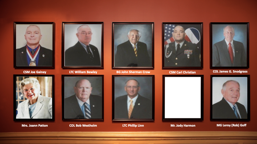A row of framed portraits of a man in a suit and tie