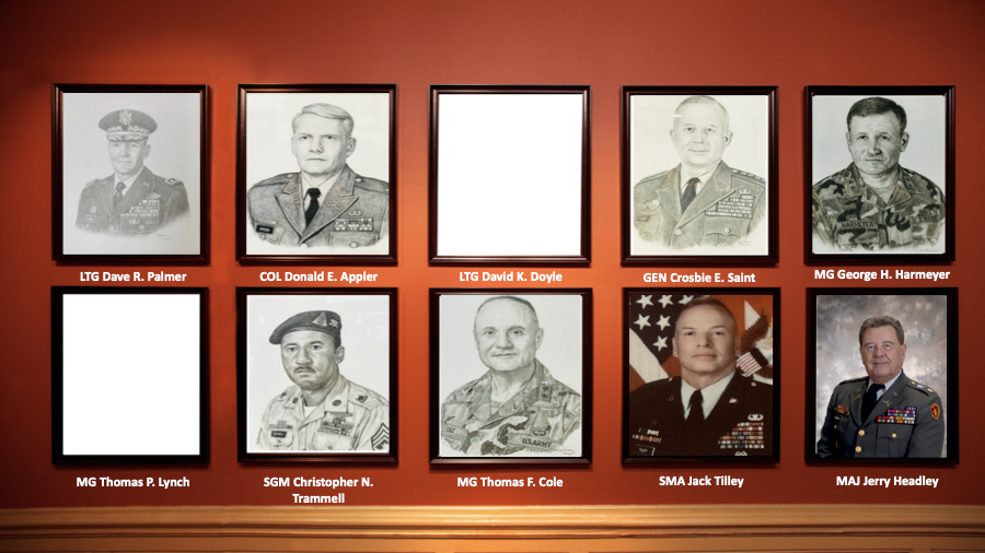 A row of framed pictures of military men on a wall