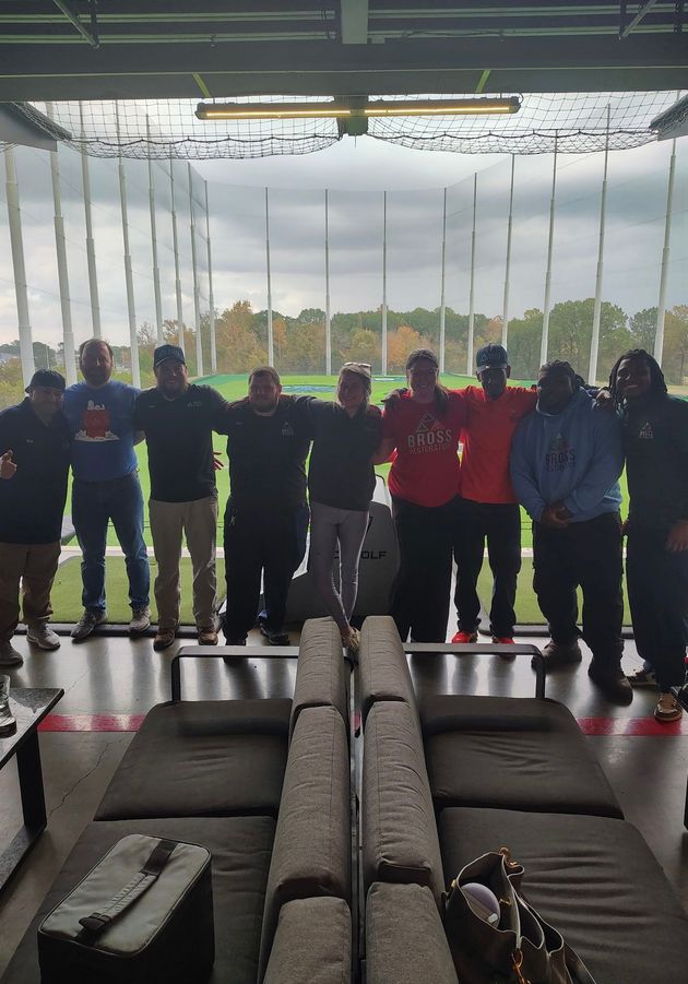 Glitchy digital display with blue and white specks, horizontal lines, and black blocks.