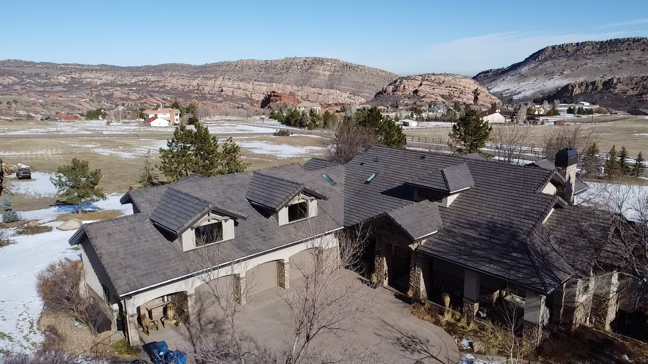 Durable commercial concrete tile roof by Kudu Roofing.