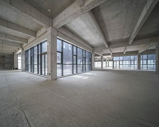 Empty Unfinished Concrete Building Interior — High Point, NC — Piedmont Concrete Finishing