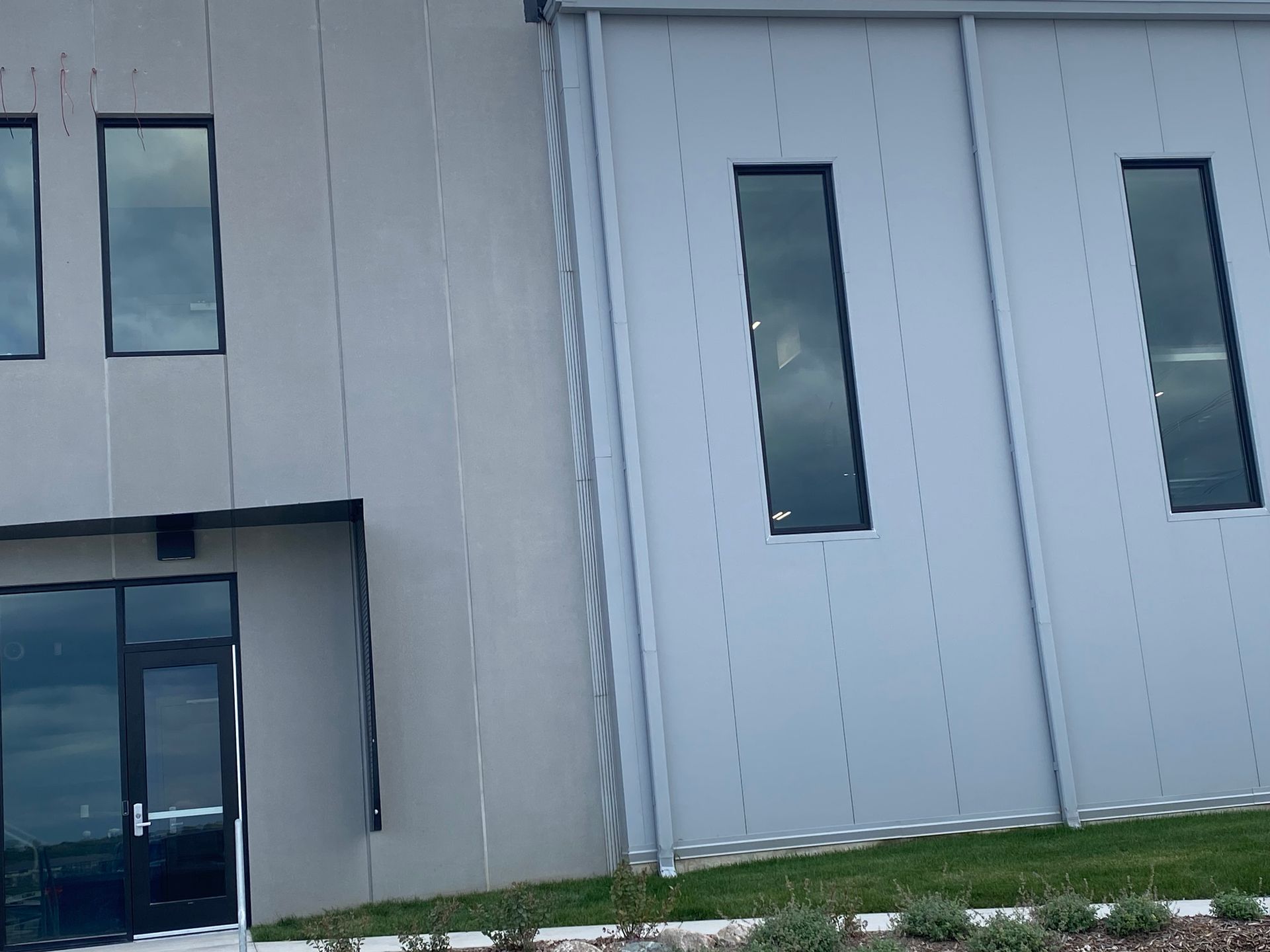 a building with a lot of windows and a door