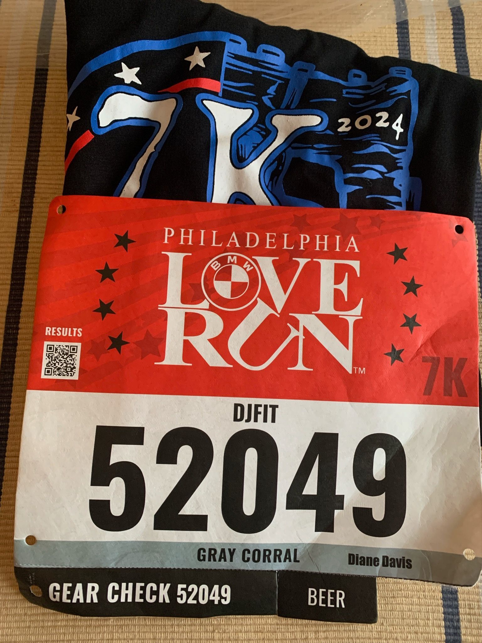 A Philadelphia love run bib with the number 52049 on it