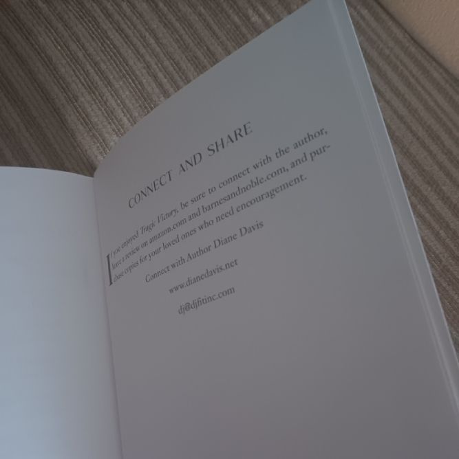 A book is open to a page that says connect and share