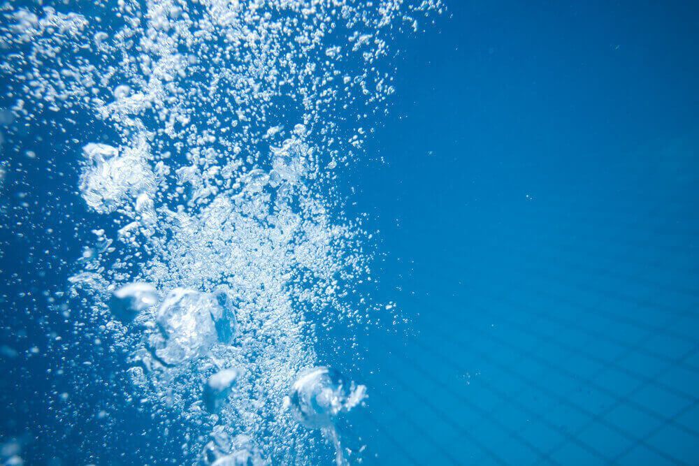 Air Bubbles in Clear Blue Water — Swim School in Rockhampton