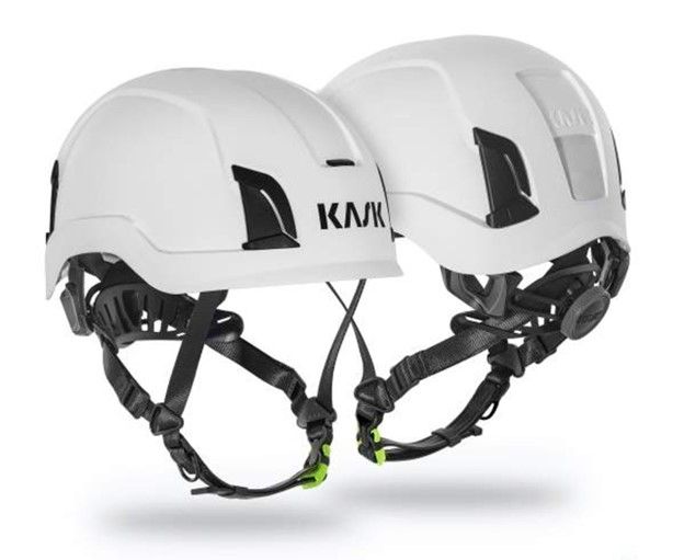 Two white kask helmets are shown side by side