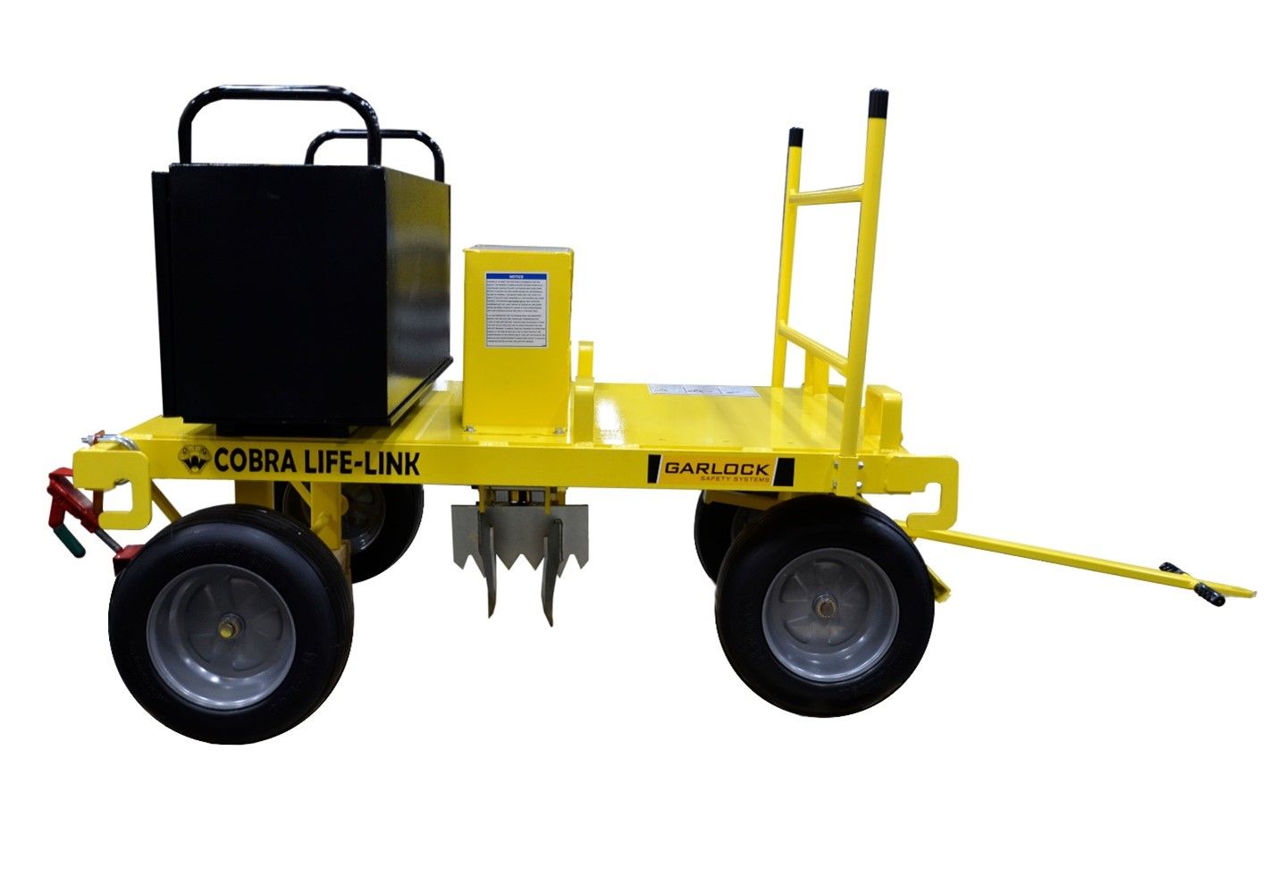 A yellow cart with a black box on top of it.