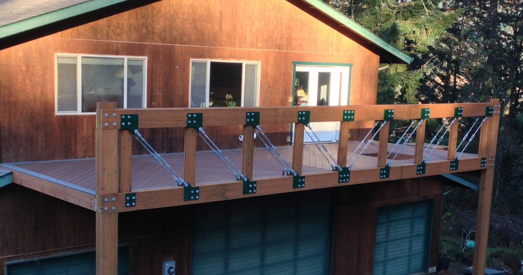 a house with a wooden deck that looks like a bridge