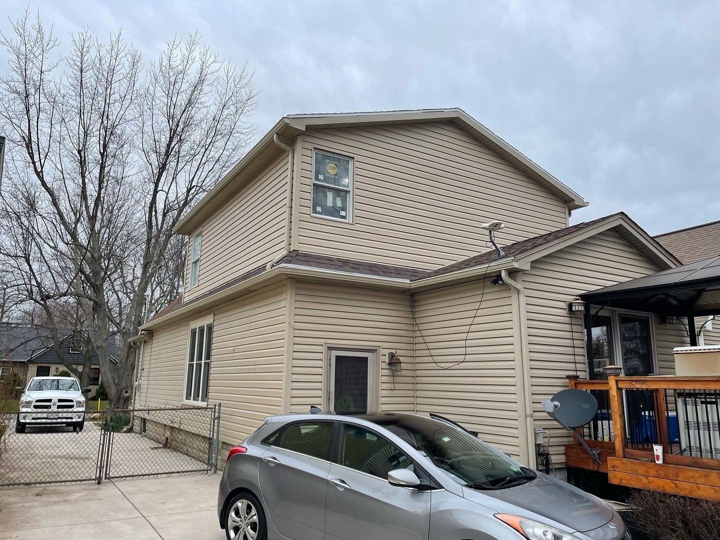 Two Storey House With Car Outside