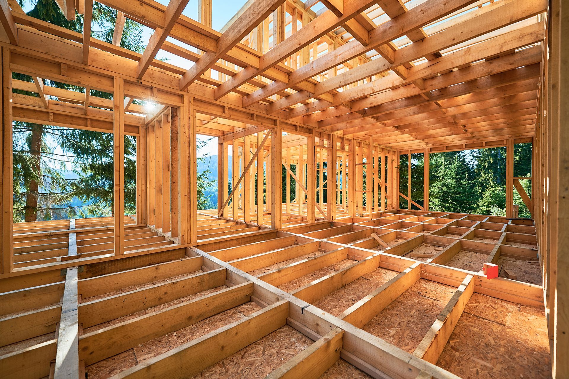 The inside of a wooden house under construction.