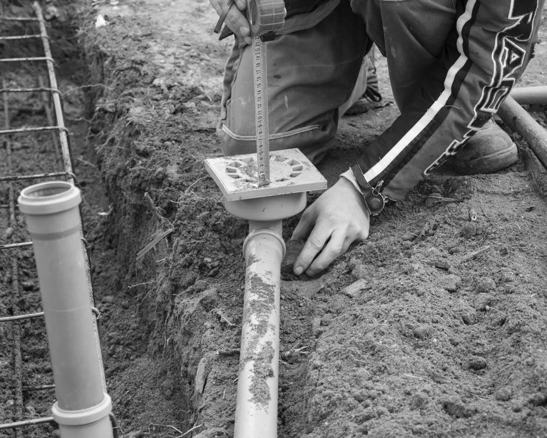 plumber connecting a pipe