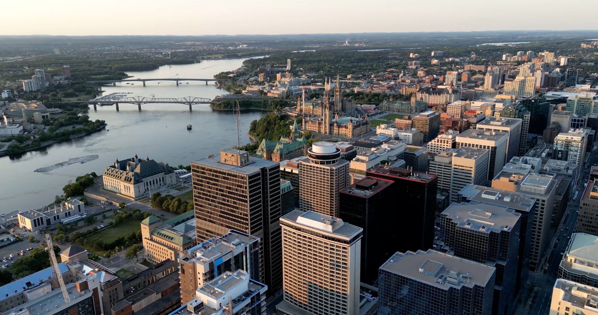 An aerial view of a city with a river running through it.