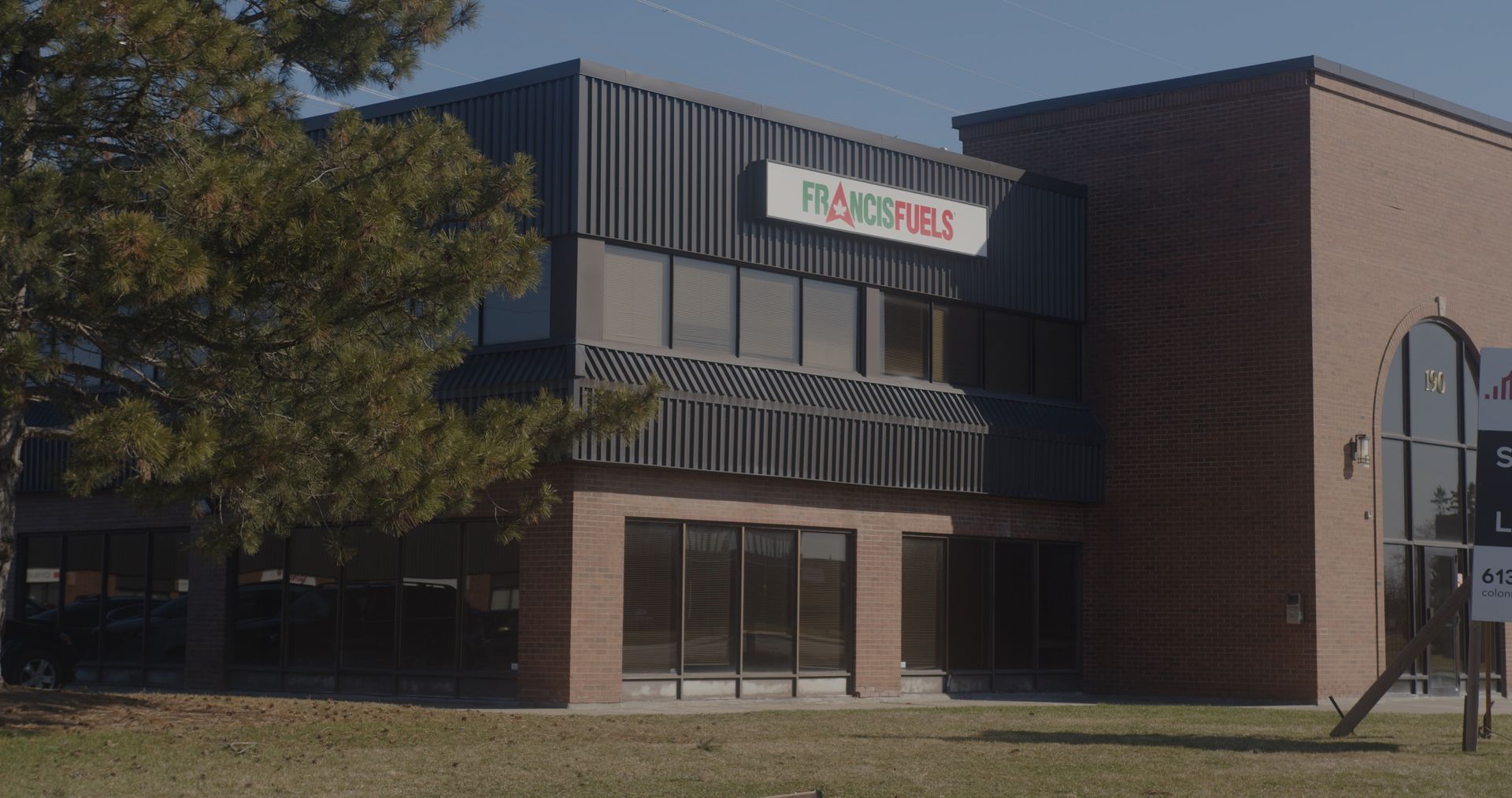 A large brick building with a sign that says rangers on it.