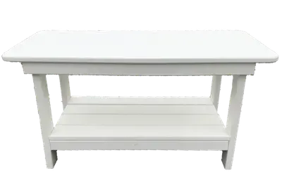 A white table with a shelf underneath it on a white background.