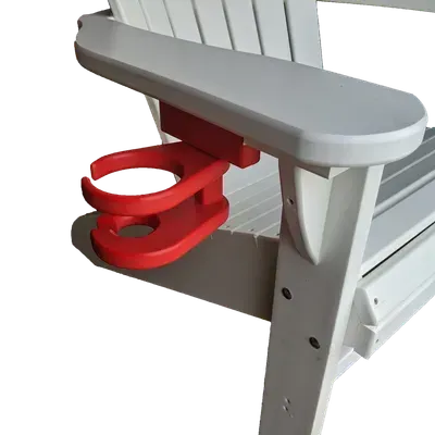 A white chair with a red cup holder attached to the arm