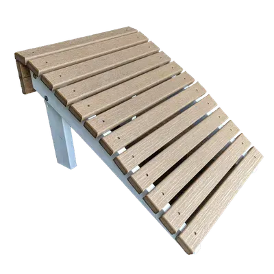 An ottoman with a white frame on a white background.