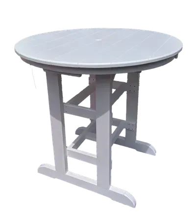A white table with a round top on a white background