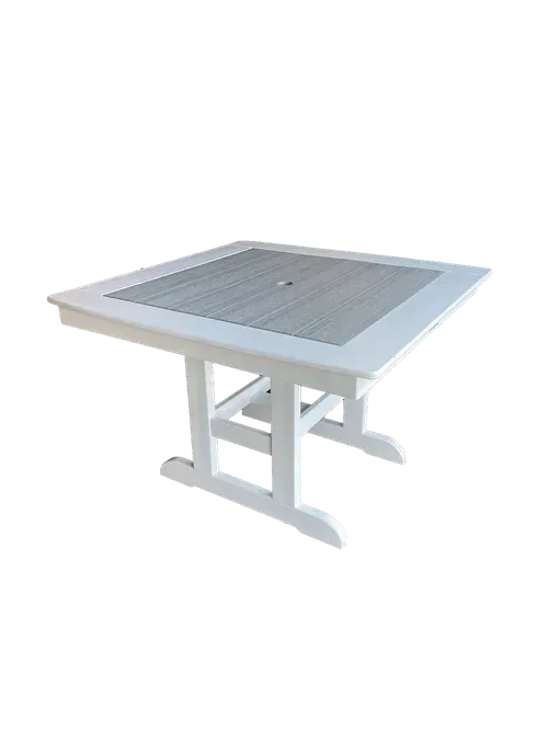 A white table with a gray top on a white background.