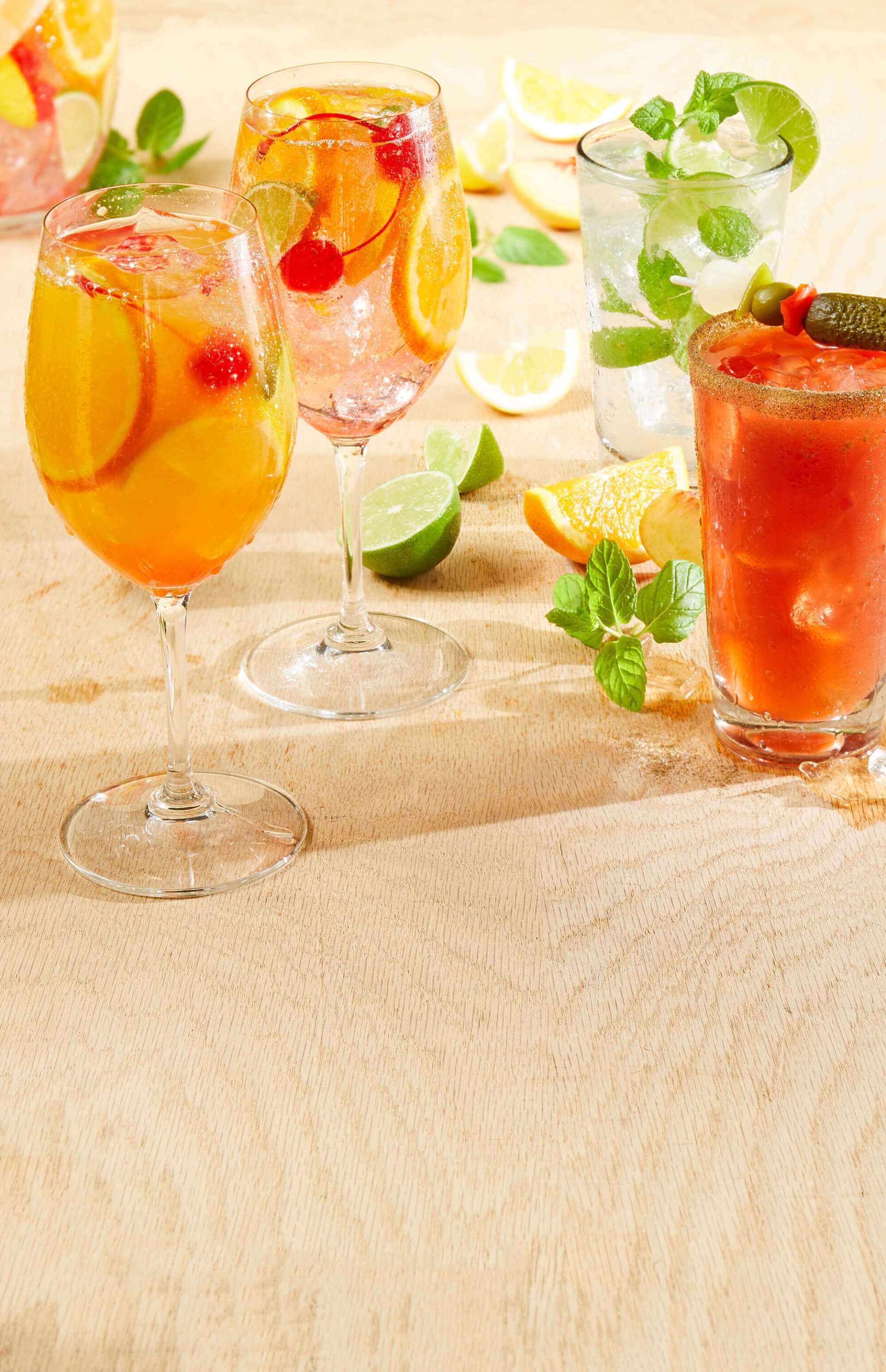 There are many different types of drinks on the table.