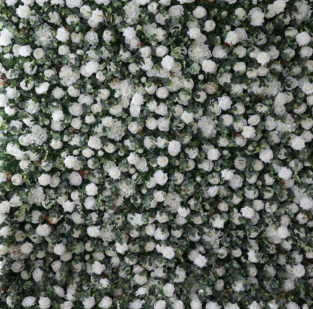 a wall of white flowers and green leaves on a white background .
