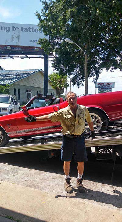 Garden Brakes Repair — Man and Red Car in Apopka, FL