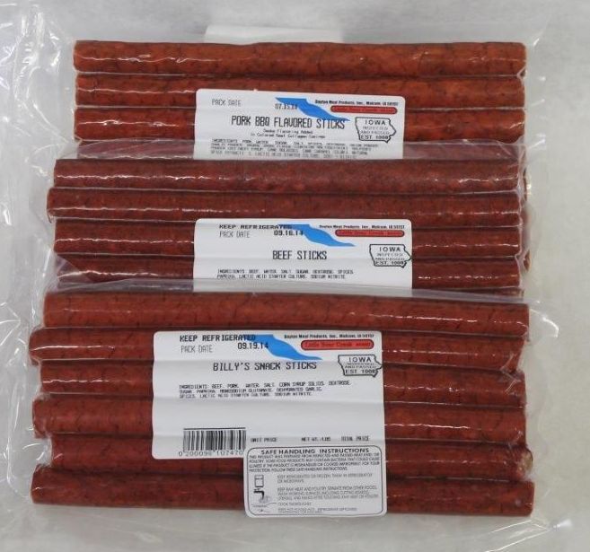 Three bags of beef sticks are stacked on top of each other
