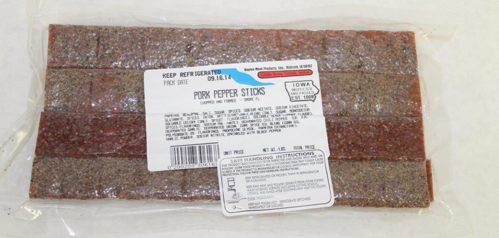 A package of bricks with a label on it is sitting on a table.