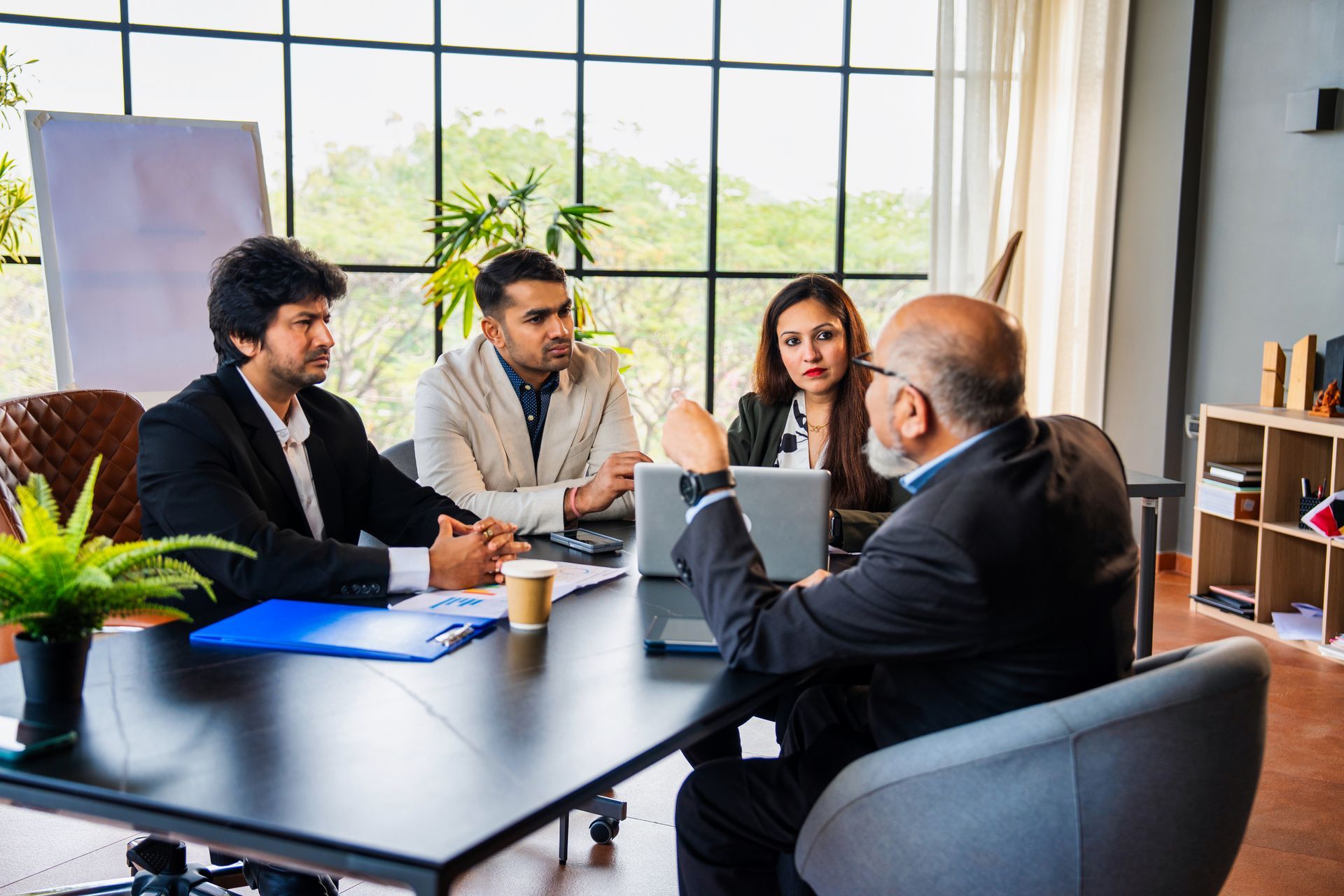 A diverse group of businesspeople in suits