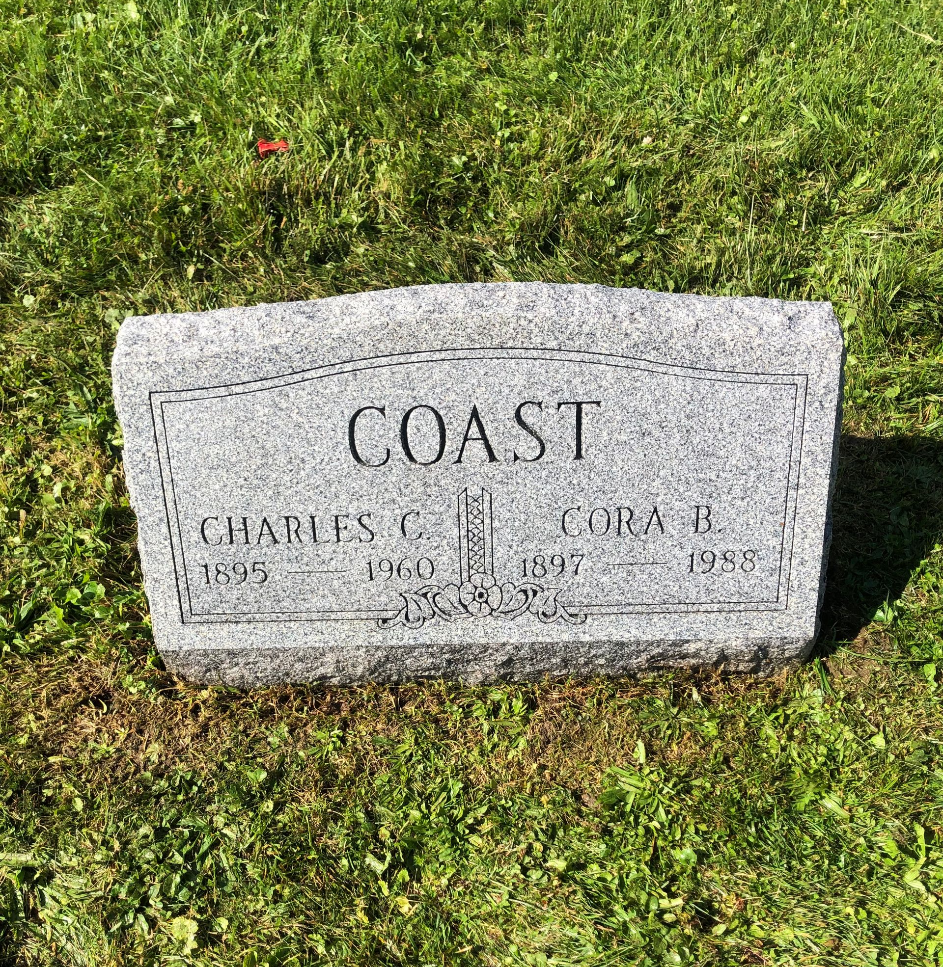 Gray granite tombstone with 