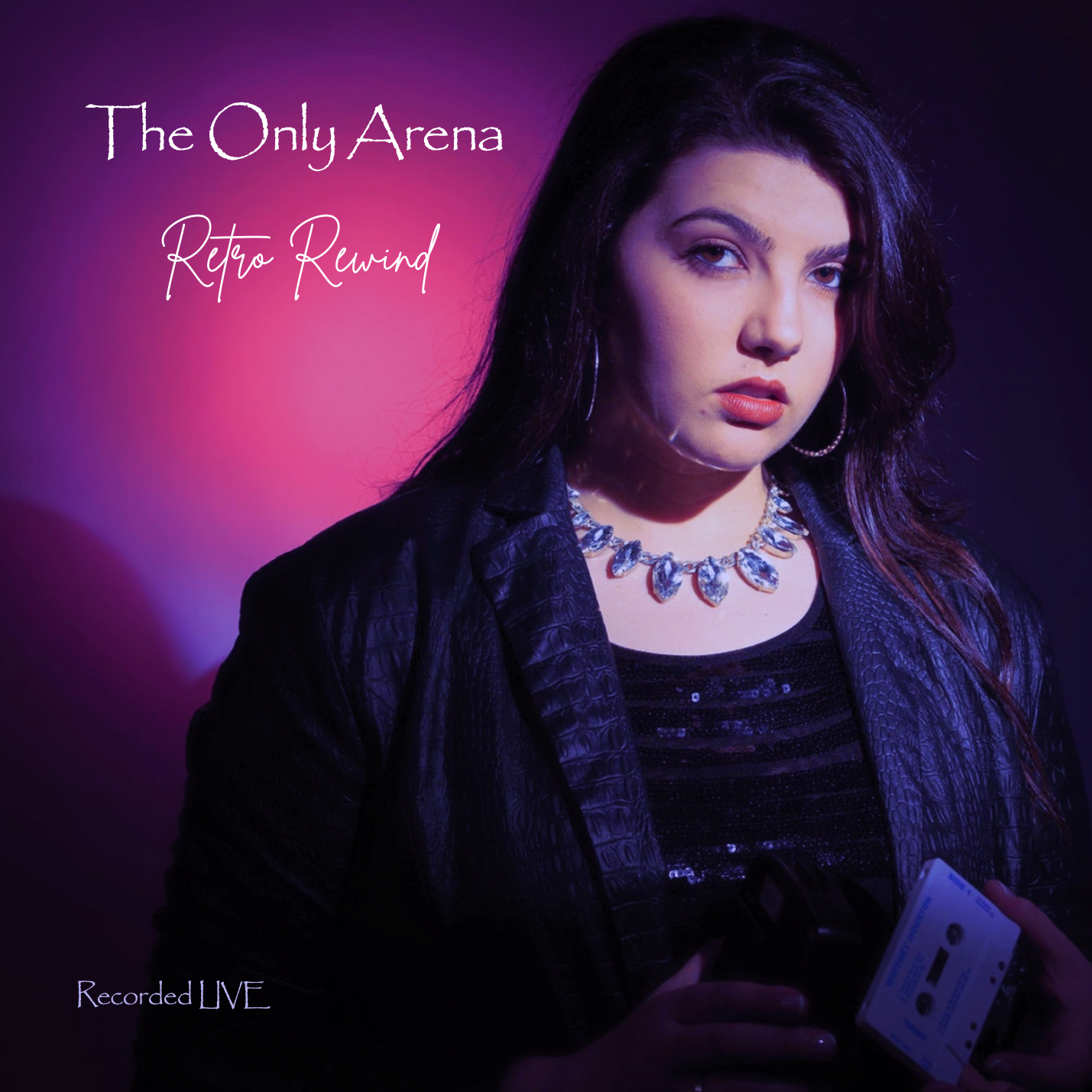 headshot of The Only Arena wearing dark clothing and shiny necklace