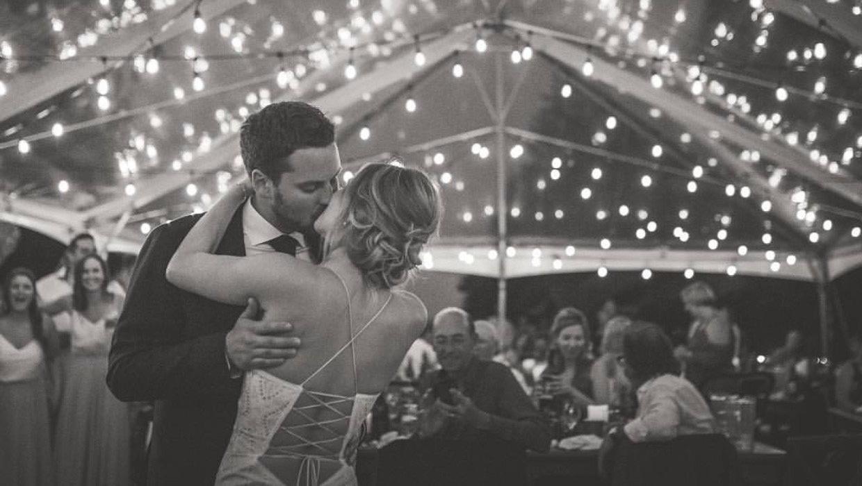 DJ Productions newlywed couple kissing during first dance