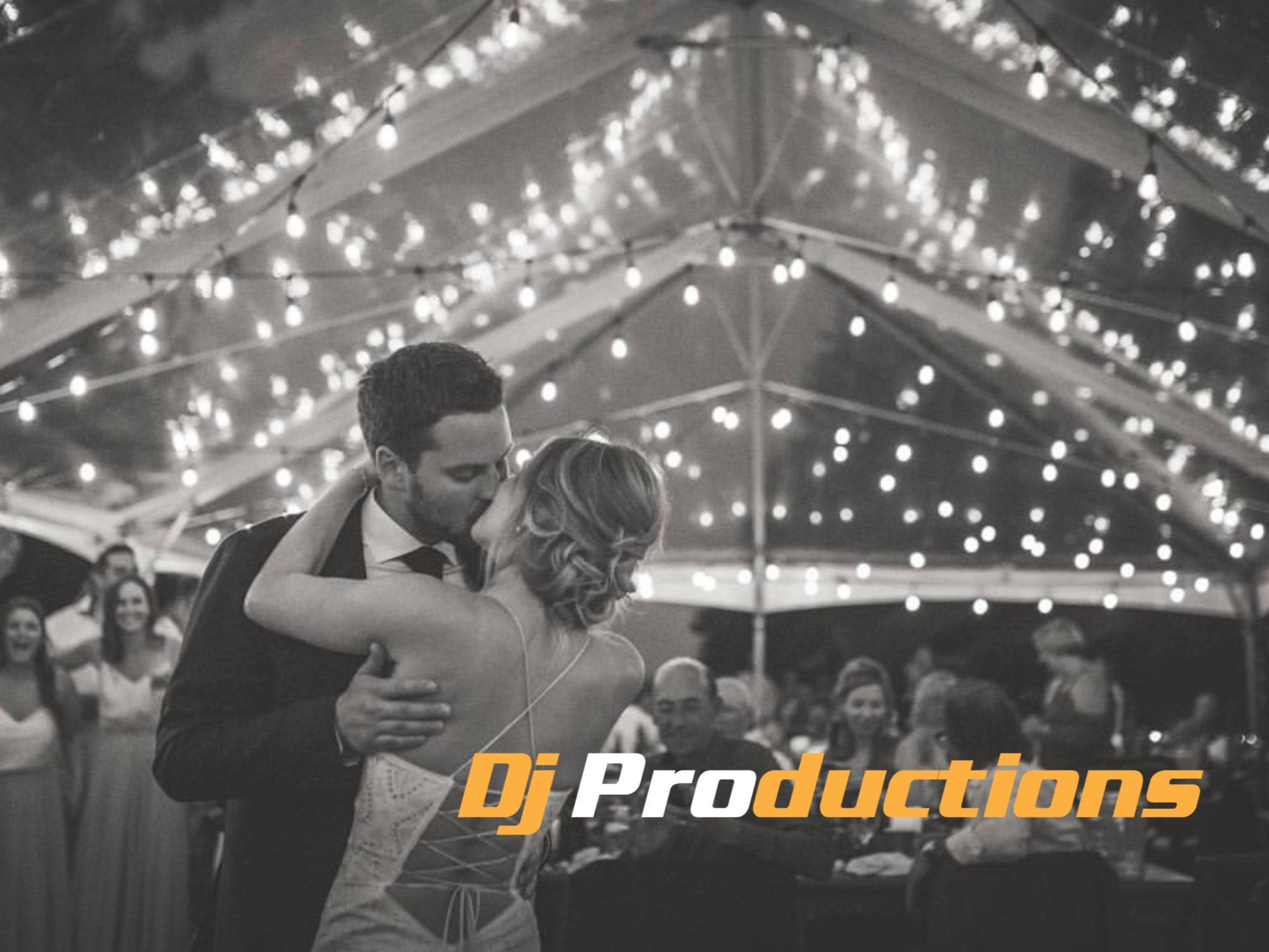DJ Productions picture of newlyweds kissing during first dance
