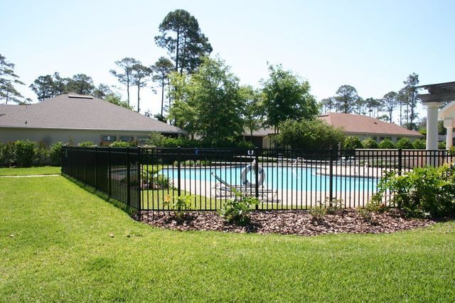 Home Pool Aluminum Fence — Yulee, FL — Creative Services & Fence Company Inc.