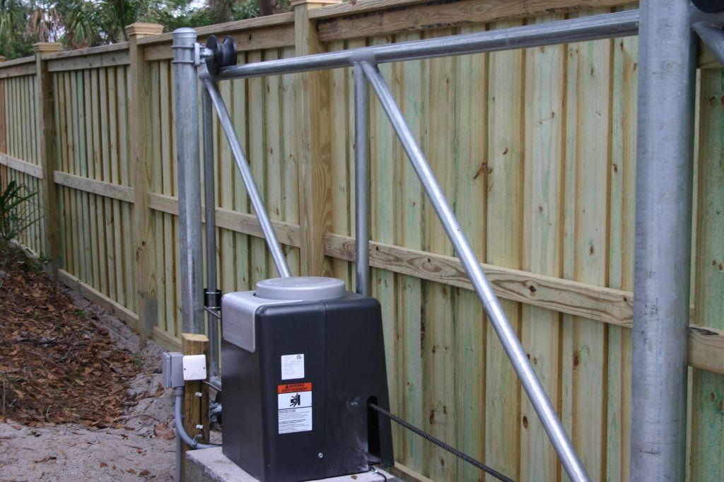 Automated Wood Gate Operators — Yulee, FL — Creative Services & Fence Company Inc.