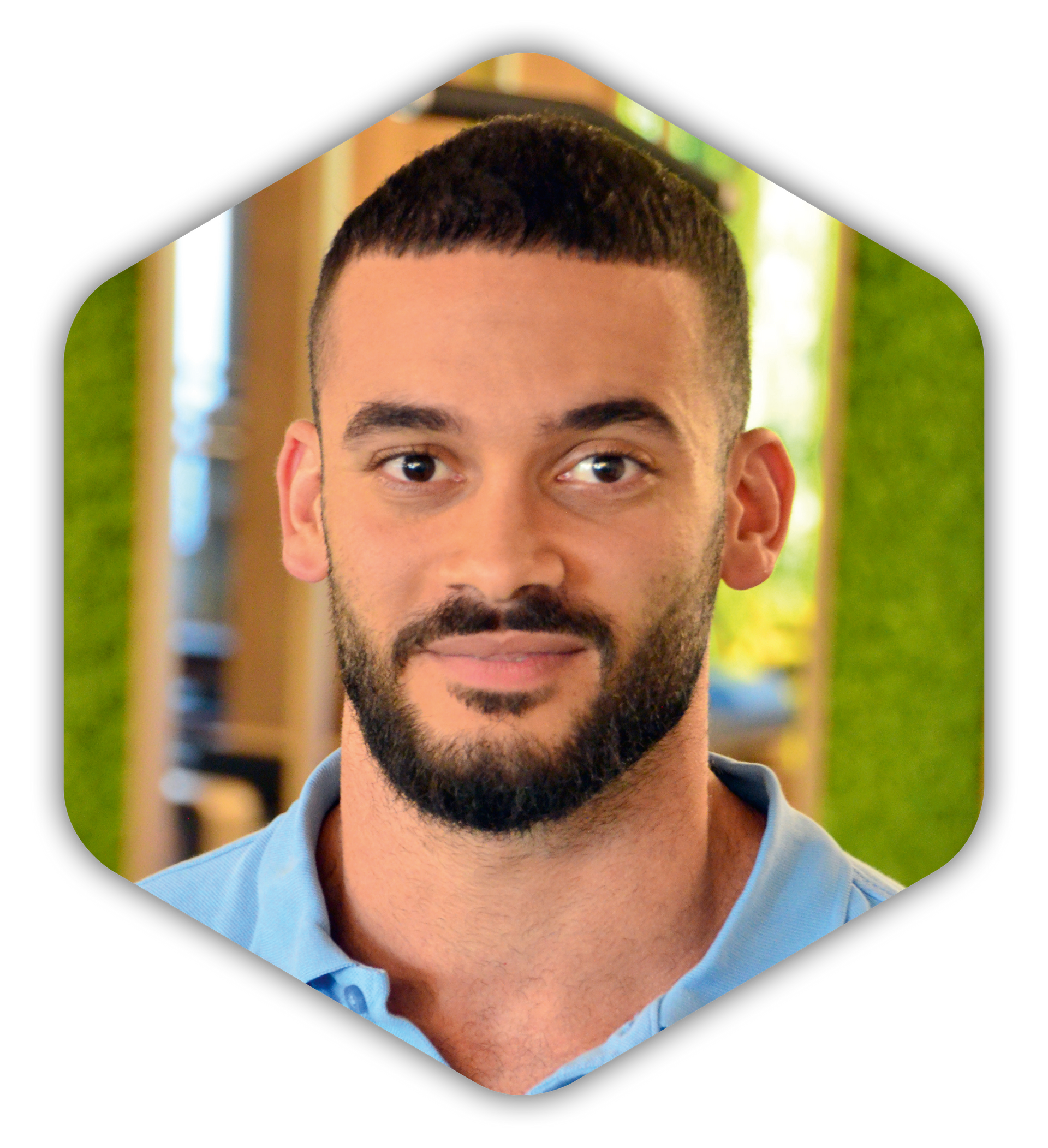 Die Silhouette eines Mannes ohne Gesicht in einem Sechseck.