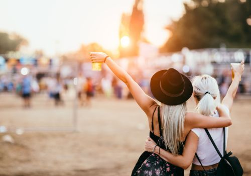 two people haveing a good time at festival