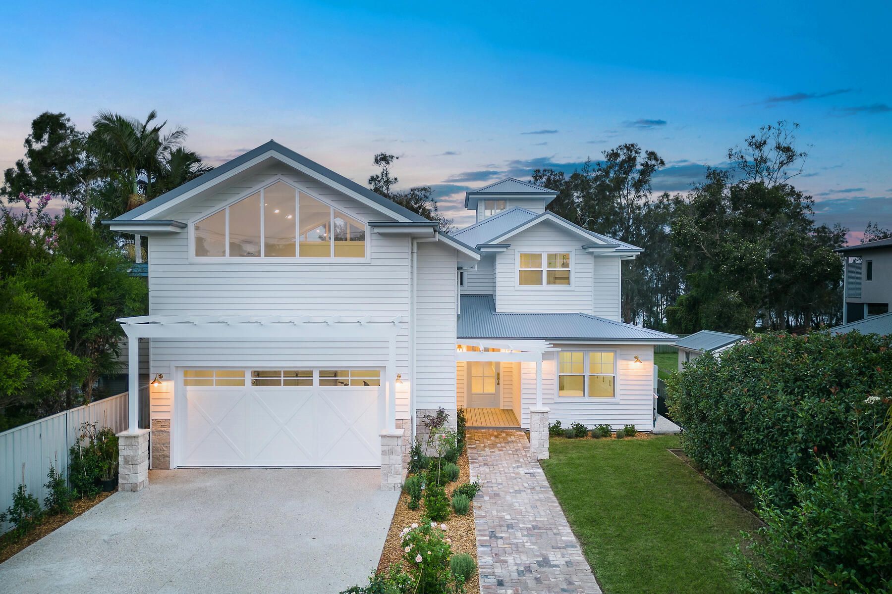 Exterior weatherboard home with fresh paint and clean lines