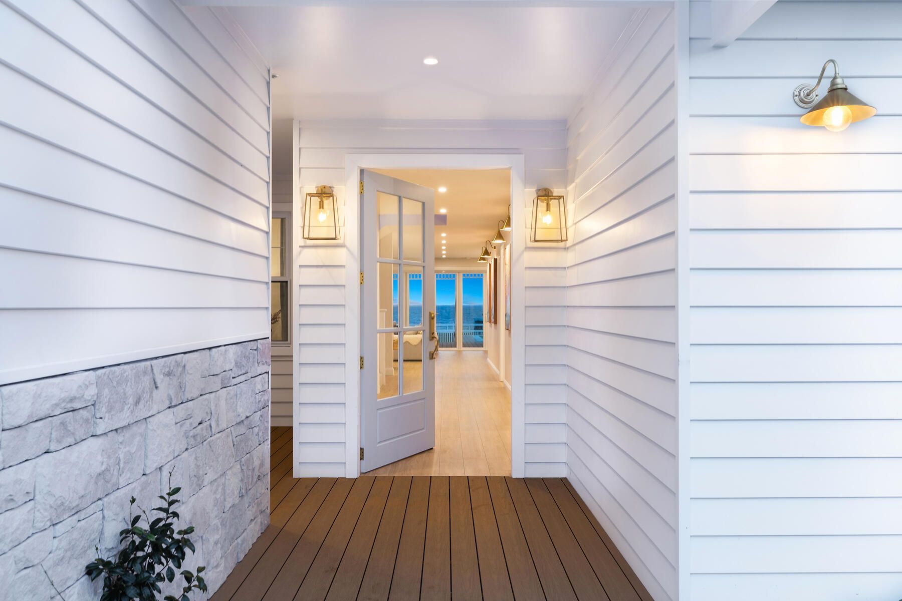 Newly painted front entryway with timber door and trims