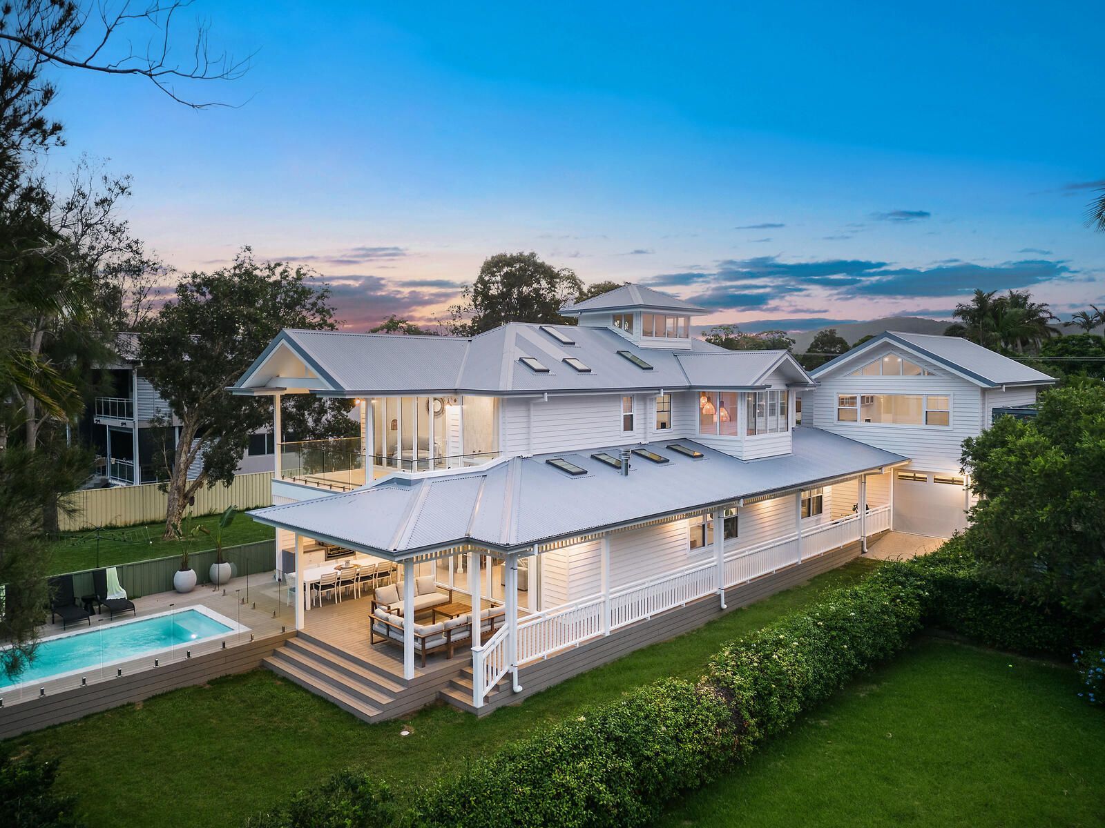 Fresh exterior repaint of a rendered coastal home