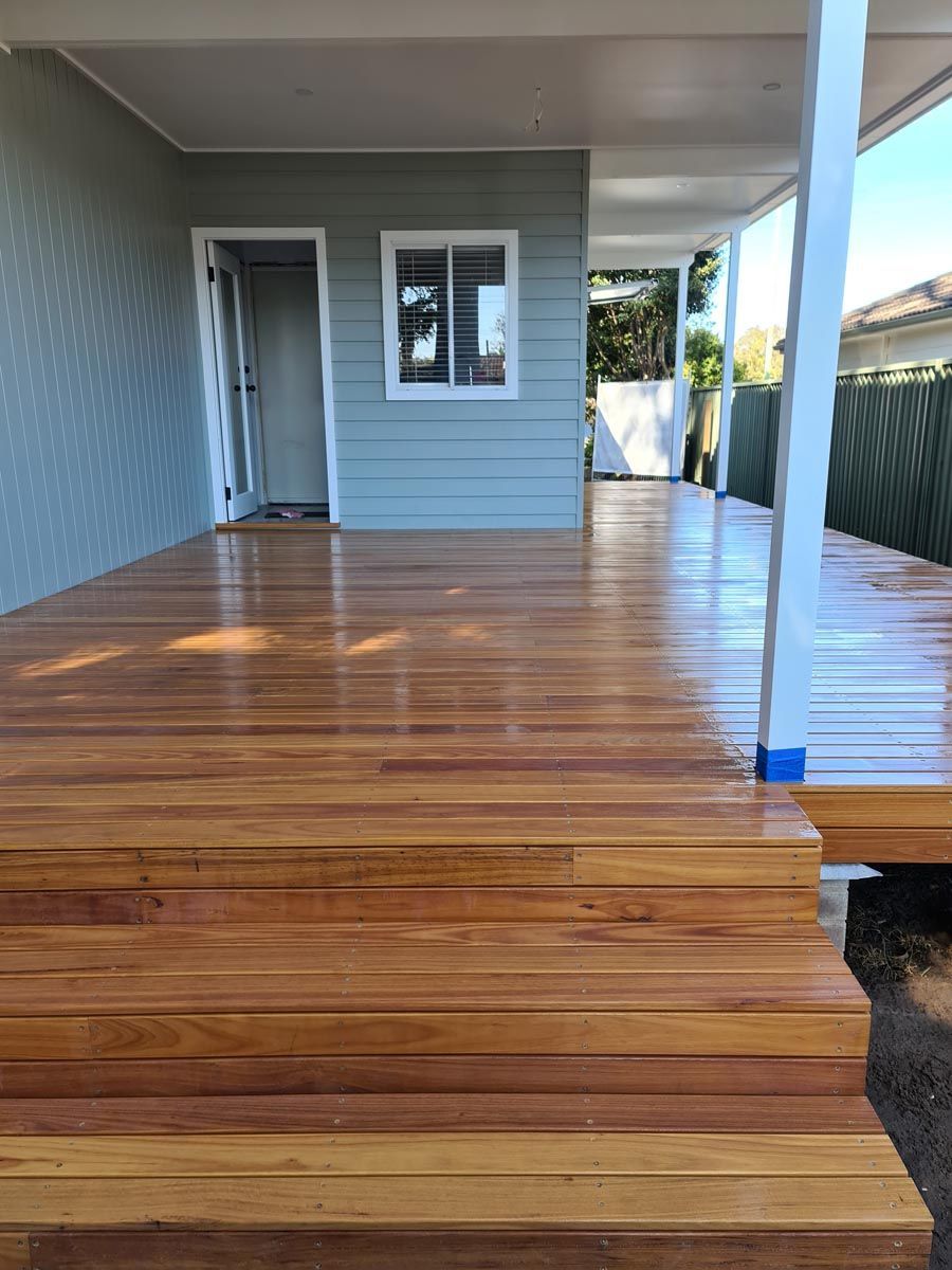 Restored timber deck with rich natural stain finish