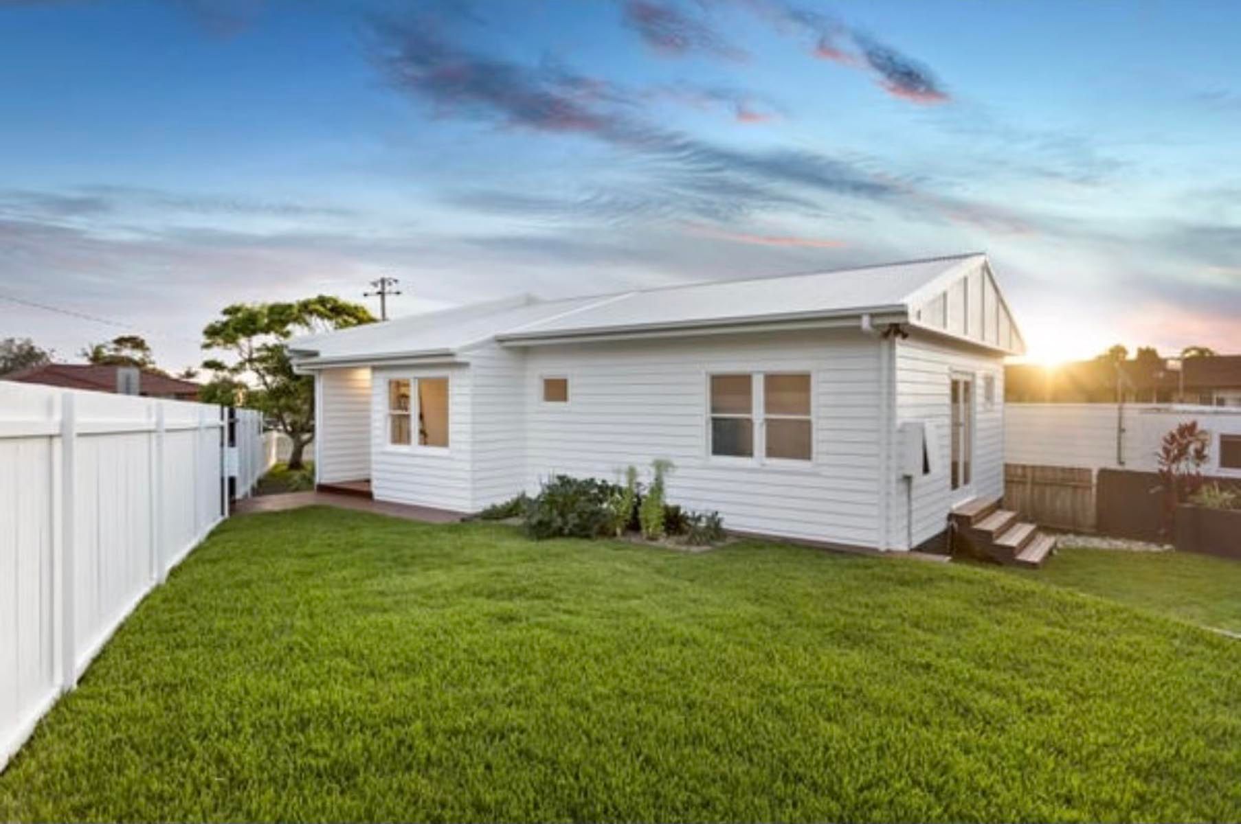 Exterior weatherboard home with fresh paint and clean lines